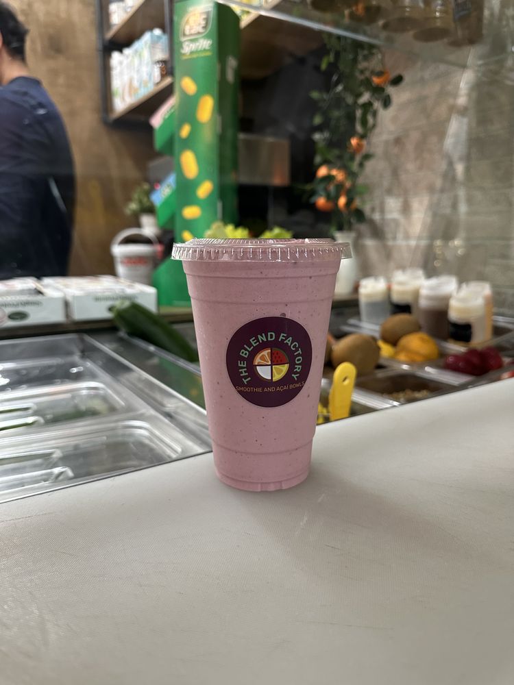 Pink berry smoothie on The Blend Factory preparation counter