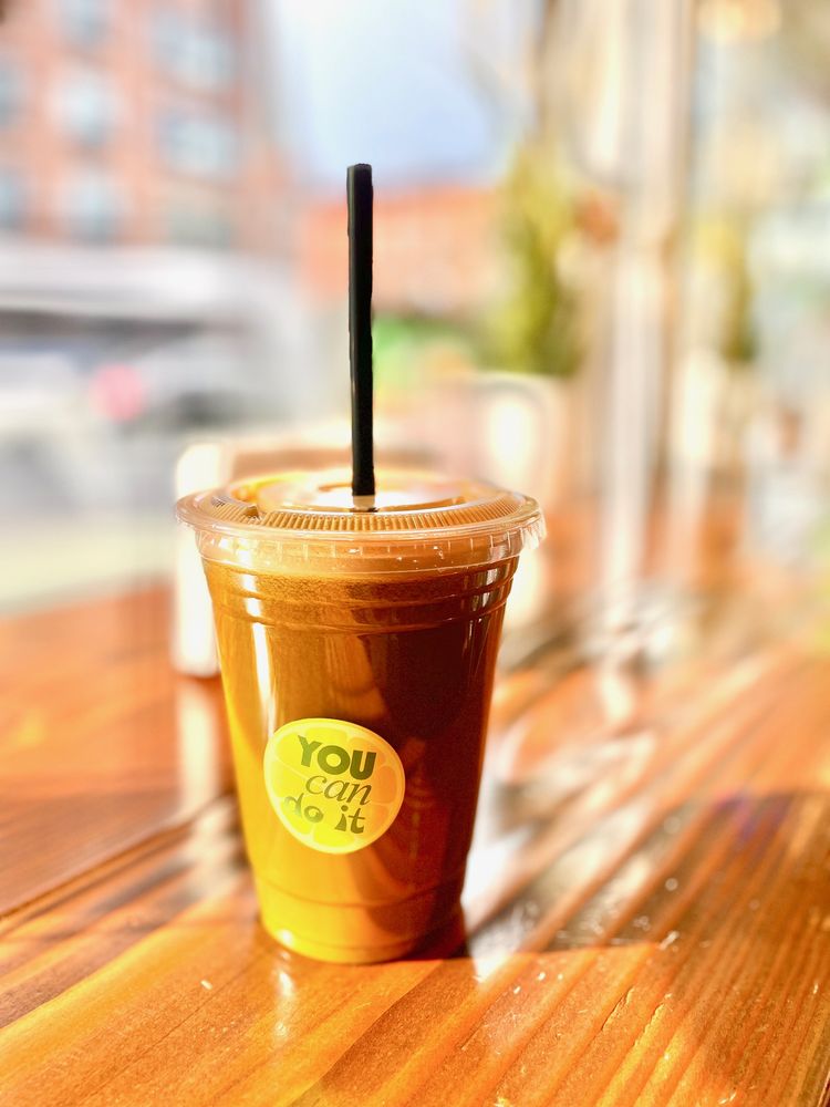 Fresh juice glowing in sunlight on The Blend Factory counter